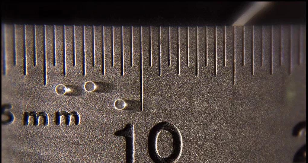 Laser Micromachining Thin Glass for Biotech Applications