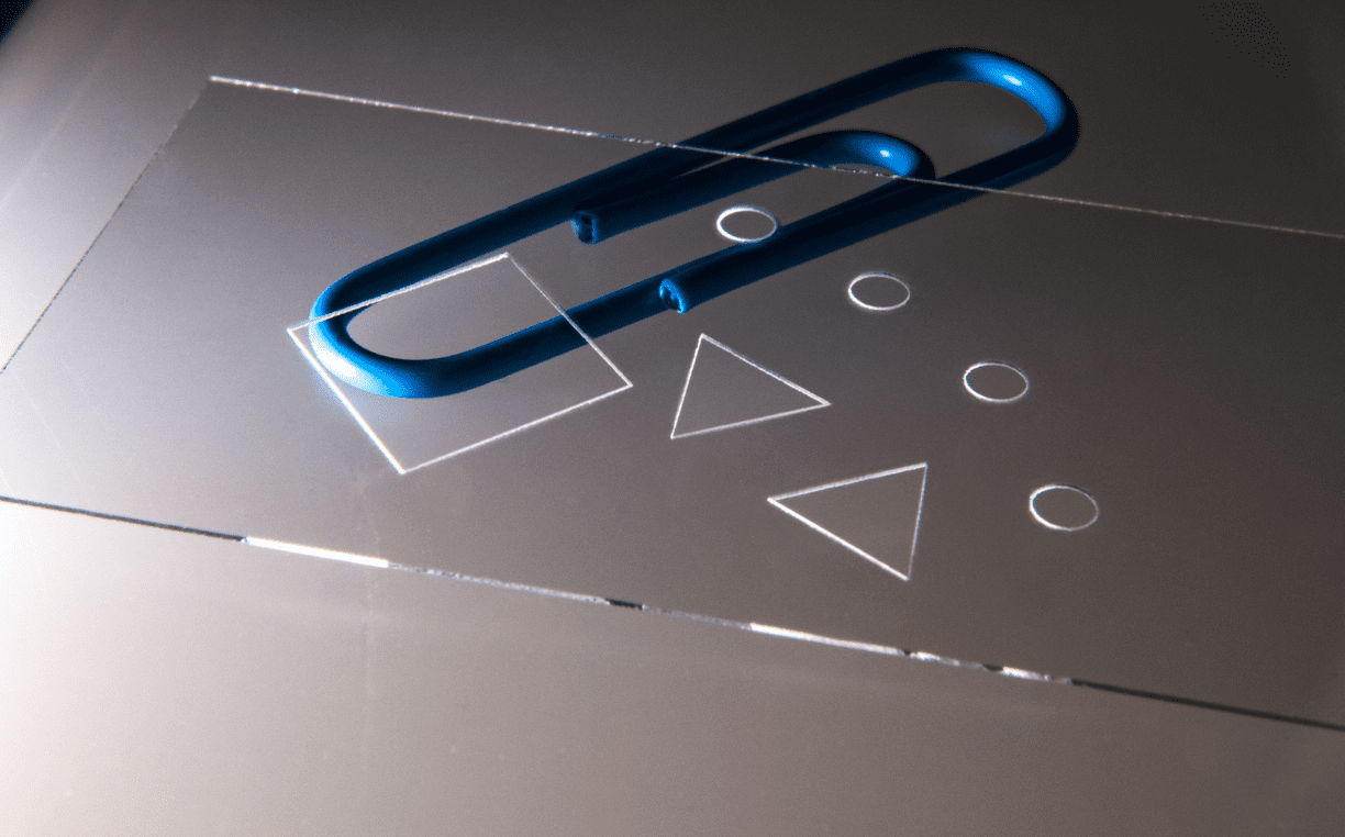 Precision Laser Drilling of Glass Slides and Coverslips for Microfluidics and Biotech Applications